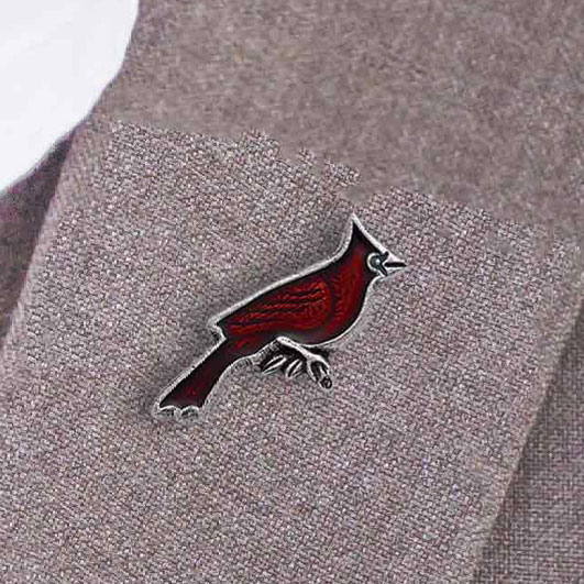 Cardinal lapel pin shown on a lapel