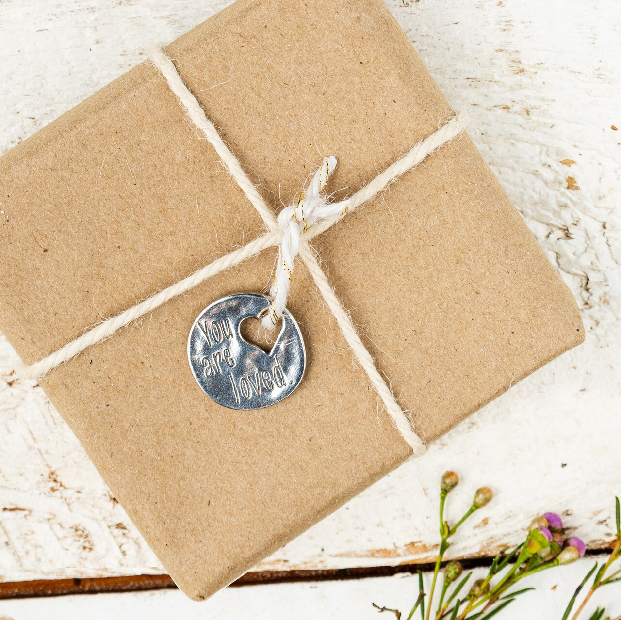 pocket charm with text